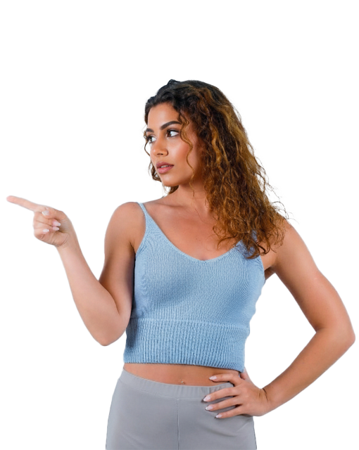 Fat loss expert at Vecura Wellness Clinic in white uniform with crossed arms